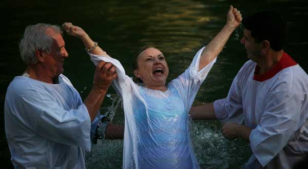 Christian Pilgrims Baptized in Jordan River