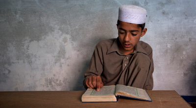 images archives stories Reuters Pictures Reuters Pakistan mosque Muslim boy studies Quran photog Rebecca Conway