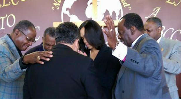 These pastors in Baltimore prayed yesterday for Marilyn Mosby, the city of Baltimore states attorney