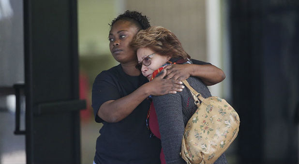 Two women embrace at a community center in San Bernardino, California, on Wednesday. A team of chaplains from the Billy Graham Rapid Response Team are ministering to family members of victims after Wednesday's mass shooting.