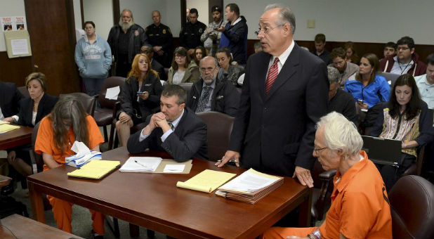 Deborah Leonard and Bruce Leonard sit next to their attorneys in court for a manslaughter charge against them in the death of their 19-year-old son Lucas Leonard.