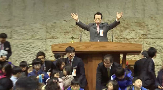 Since Rev. Samhwan Kim started the church in 1980, it has grown to more than 120,000 members.