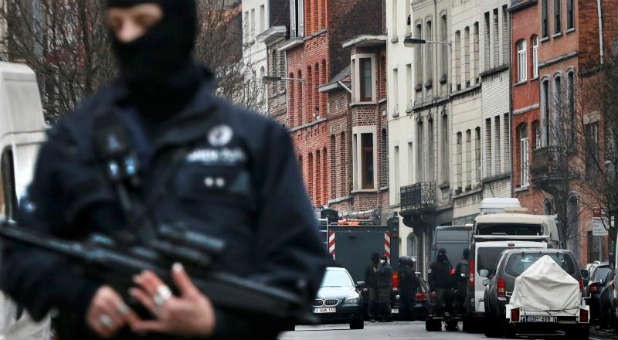 Police at the scene of a security operation in the Brussels suburb of Molenbeek in Brussels, Belgium.