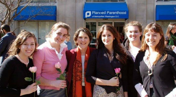 Lila Rose, third from the right, outside a Planned Parenthood.