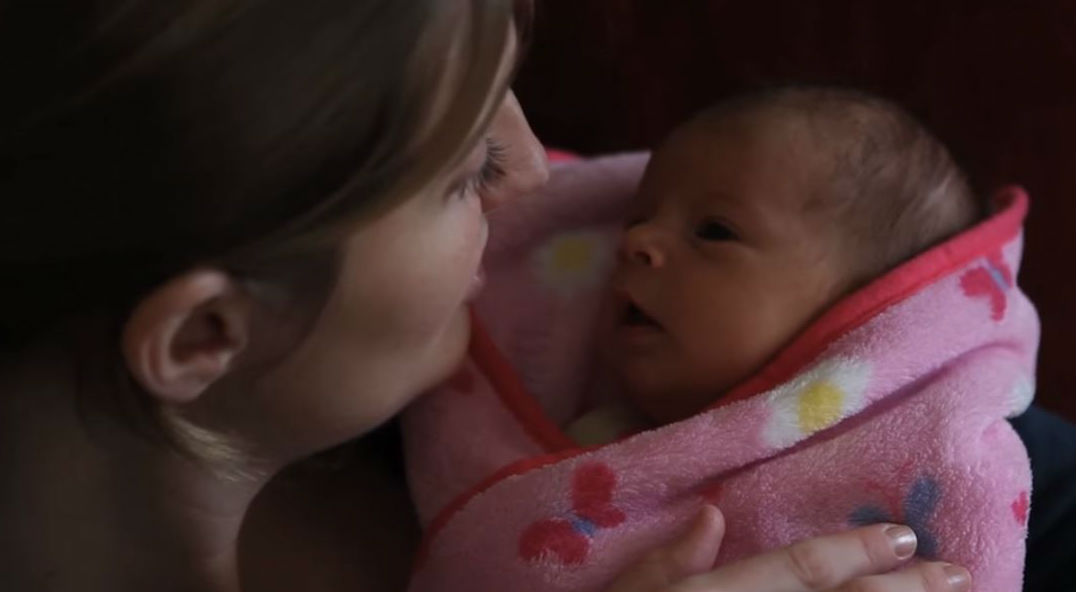 Annie holding baby Chloe