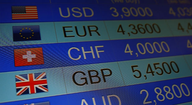 Rates of currencies, including British Pound, are displayed after Brexit referendum on an electronic board at a currency exchange in Warsaw