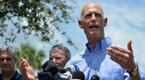 Florida Governor Rick Scott speaks at news conference.