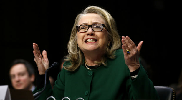 U.S. Secretary of State Clinton reacts while testifying on the Benghazi attacks during Senate Foreign Relations Committee hearing in Washington.