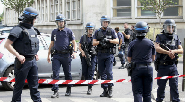 French police secure a street as members of special forces carried out counter-terrorism swoop at different locations in Argenteuil, a suburb in northern Paris, France