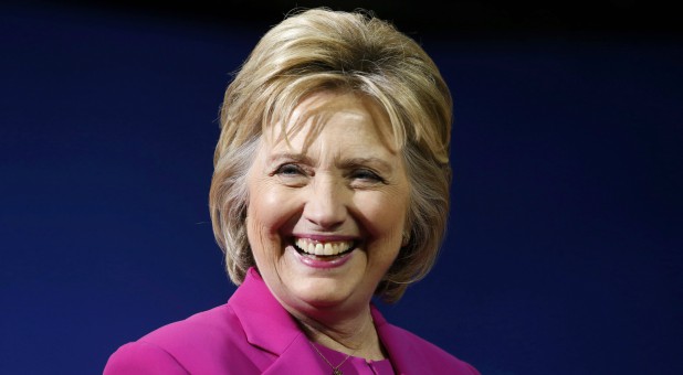 Democratic U.S. presidential candidate Clinton smiles at campaign rally