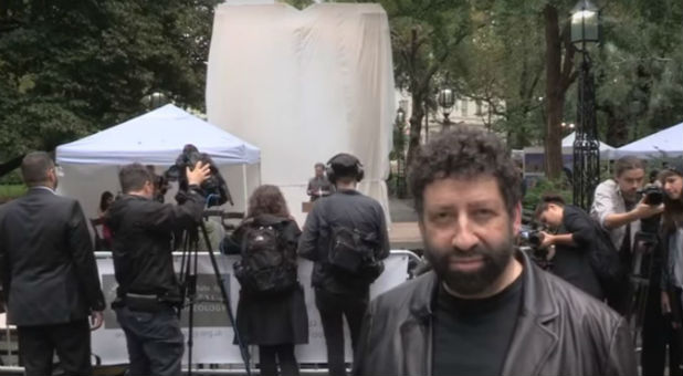 Jonathan Cahn in front of the replica Baal arch.