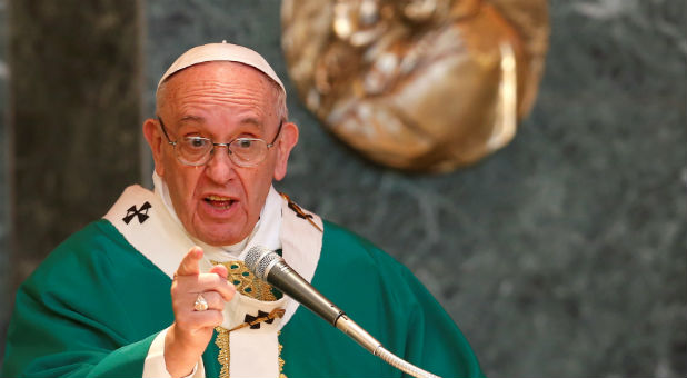 Pope Francis speaks as he celebrates Mass during a visit to the parish of St. Mary Josefa of the Heart of Jesus in Rome