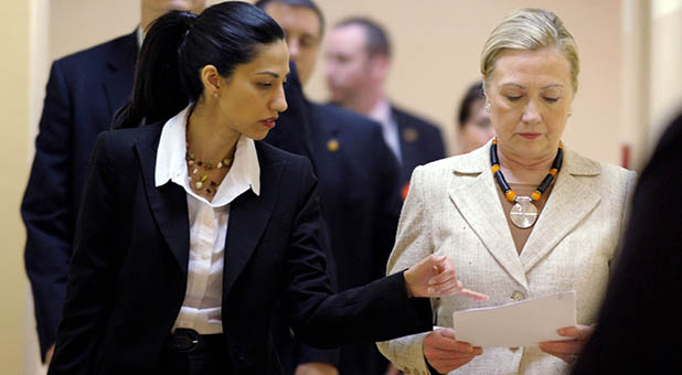 Former Secretary of State Hillary Clinton and long-time aide Huma Abedin