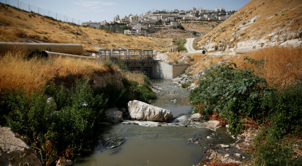 Sewage flows in Kidron Valley, on the outskirts of Jerusalem, July 6, 2017.