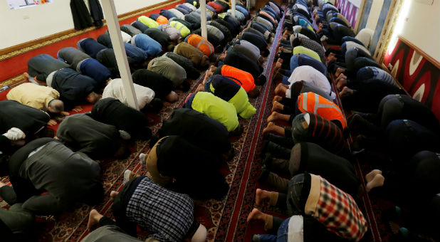 Muslims perform Friday prayers inside the Redfern Mosque in Sydney, Australia.