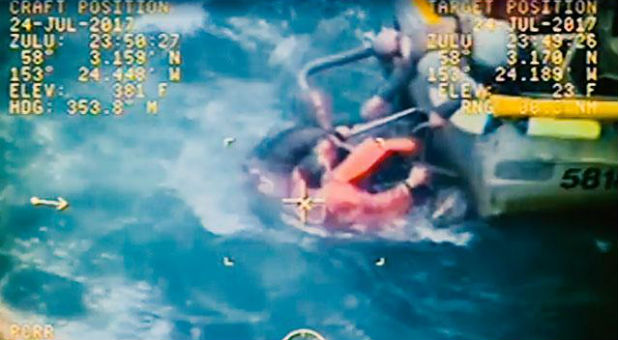 Only moments after Trosvig dove into the water, a US Coast Guard MH-60 Jayhawk helicopter arrived at the scene capturing the rescue on video.