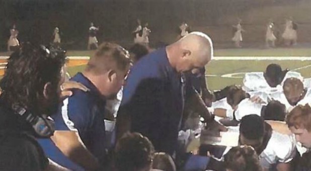 School District Orders Coaches to Stop Bowing Heads in Prayer