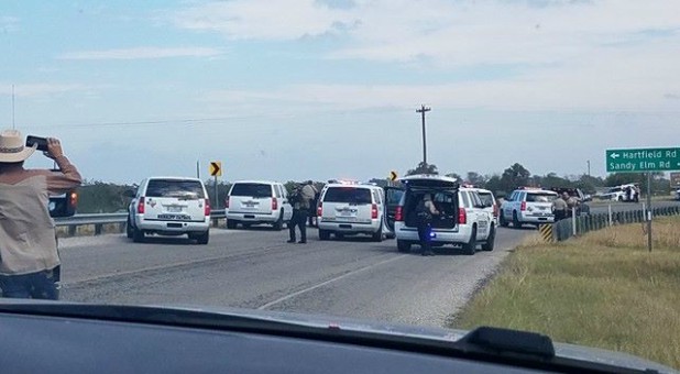 Police cars are seen at Sutherland Springs, Texas.