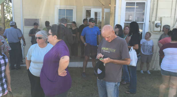 Sutherland Springs, Texas, residents gather after the tragic mass shooting.