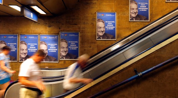 Hungarian government poster portraying financier George Soros and saying
