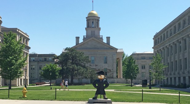 School mascot Herky the Hawk stands in front of the Old Capitol Museum at the University of Iowa, in Iowa City, Iowa.