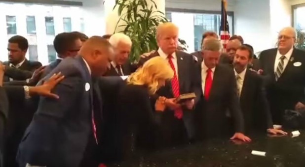 Evangelical leaders pray over Donald Trump.