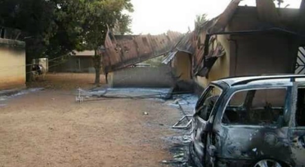 Fire damage to homes and a car caused by Fulani herdsmen in Kagoro, southern Kaduna