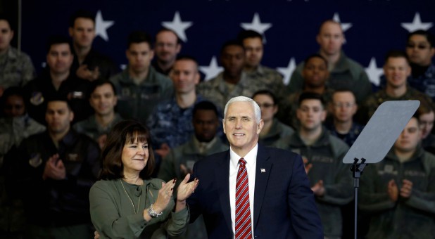 U.S. Vice President Mike Pence arrives with his wife, Karen.