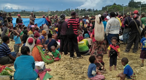 People displaced by an earthquake gather at a relief center in the central highlands of Papua New Guinea.