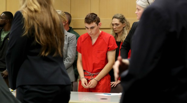 Nikolas Cruz, facing 17 charges of premeditated murder in the mass shooting at Marjory Stoneman Douglas High School in Parkland, appears in court for a status hearing in Fort Lauderdale.
