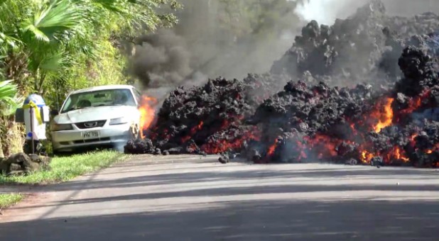 Lava engulfs a Ford Mustang in Puna, Hawaii.