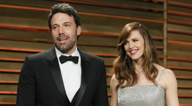Actor Ben Affleck and his wife, actress Jennifer Garner, arrive at the 2014 Vanity Fair Oscars Party in West Hollywood.