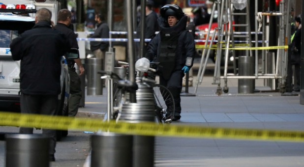 A member of the New York Police Department bomb squad is pictured outside the Time Warner Center.