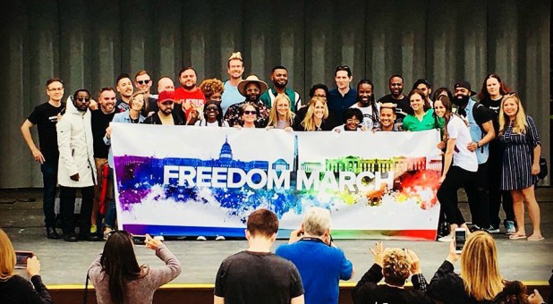 People attend the D.C. Freedom March