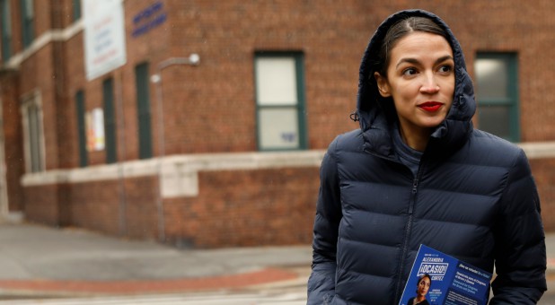Democratic Congressional candidate Alexandria Ocasio-Cortez campaigns during a whistle stop in the Queens borough of New York City.