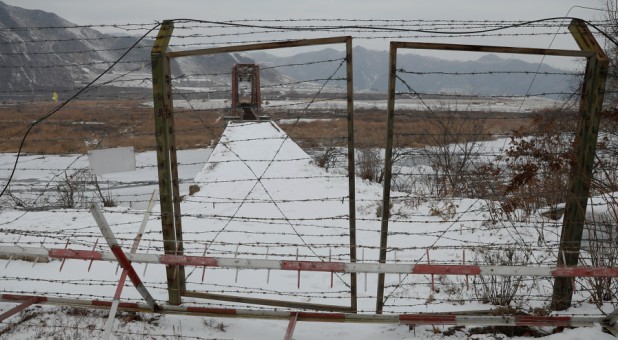 Christians Forced to Meet in a River to Avoid Capture