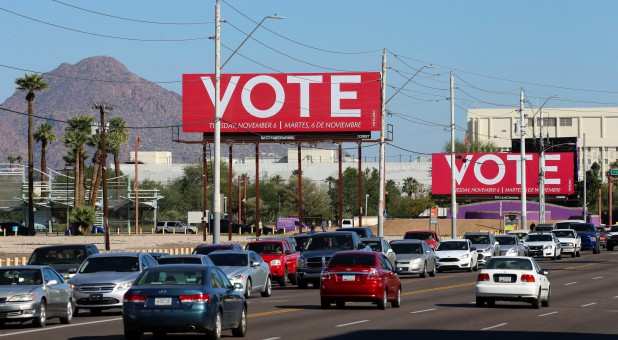 Billboards encouraging people to vote are seen following the U.S. midterm elections in Phoenix, Arizona.