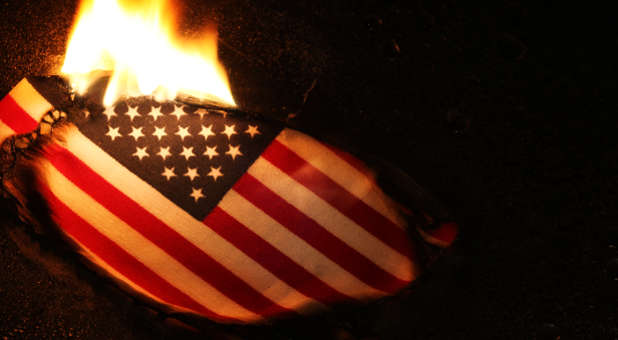 The Divided States of Arrogance: How We Mindlessly Fiddle While America Burns