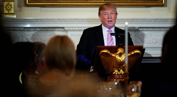 U.S. President Donald Trump speaks during a dinner before the National Day of Prayer at the White House.