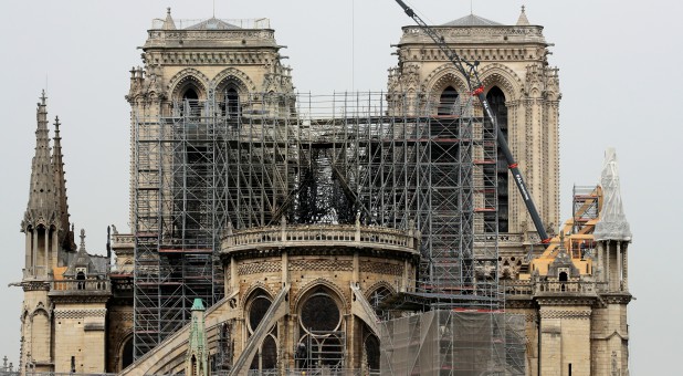 A view shows a damaged section of Notre Dame Cathedral, a week after a massive fire devastated large parts of the Gothic structure in Paris, France.