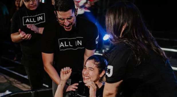 Pastor J.J. Vasquez baptizes a new believer.