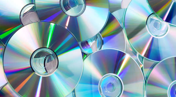 CD's piled on top of one another.