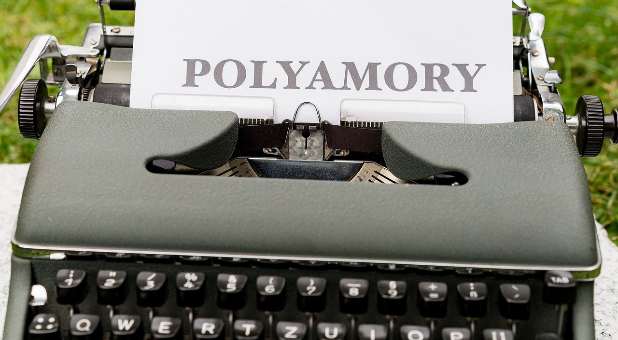 typewriter with word in roller,