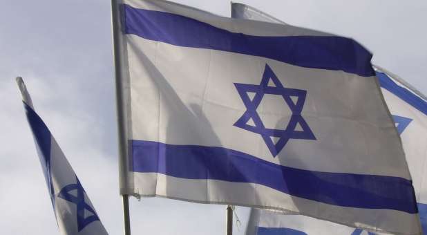 displaying showing three flags of Israel