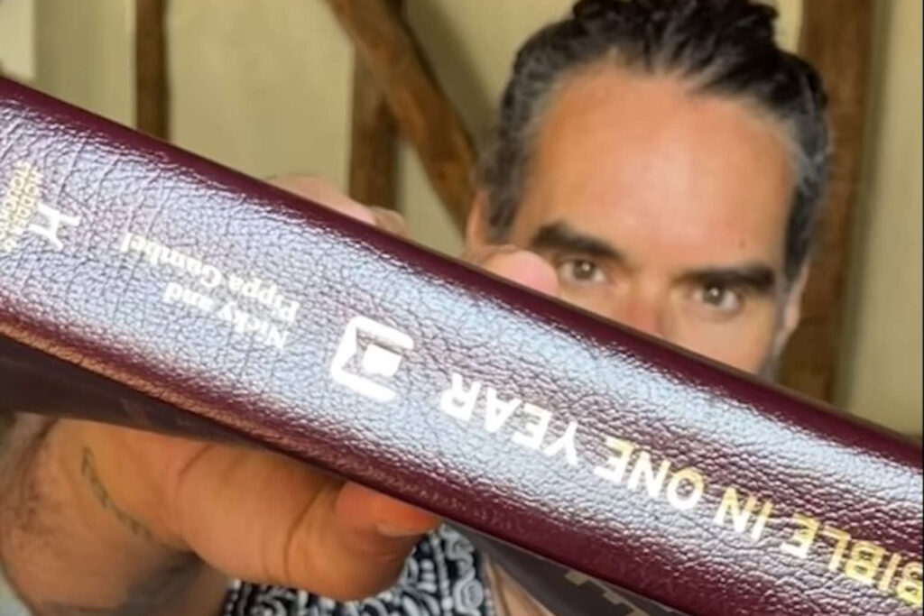 Russell Brand with a Bible