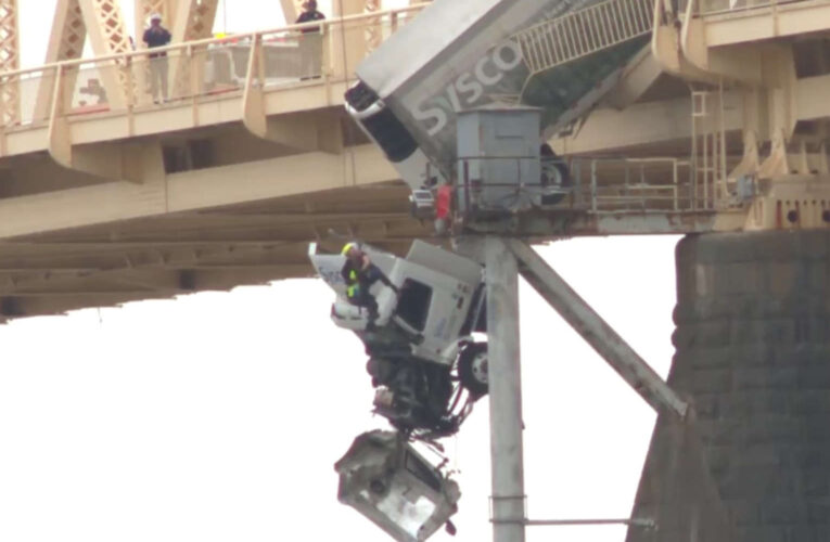 MUST SEE: 18-Wheeler Dangles from Bridge, Driver Credits God